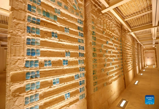 Photo shows the interior of the south tomb of King Djoser in Saqqara necropolis, south of Cairo, Egypt, on Sept. 14, 2021. Egypt on Monday opened the south tomb of King Djoser after restoration in Saqqara necropolis near the capital Cairo. The restoration process started in 2006 and involved conservation and restoration work of the lower corridors, strengthening the walls and ceilings, complete the interior inscriptions in the tomb as reassembling the granite sarcophagus. (Xinhua/Sui Xiankai)