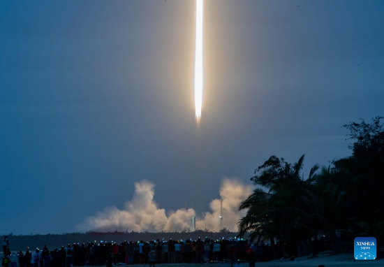 A Long March-7A rocket carrying two satellites blasts off from the Wenchang Spacecraft Launch Site in south China's Hainan Province, Dec. 23, 2021. The rocket blasted off at 6:12 p.m. (Beijing Time) at the Wenchang Spacecraft Launch Site in southern Hainan Province and soon sent Shiyan-12 01 and Shiyan-12 02 satellites into preset orbit.The mission marked the 402nd flight of the Long March carrier rockets. (Xinhua/Guo Cheng)