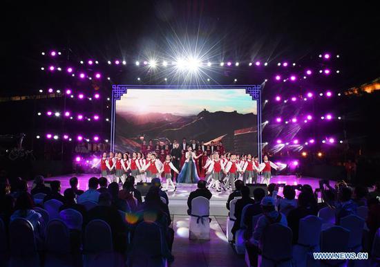 Artists perform during cultural activities to welcome the Beijing 2022 Olympic Winter Games' 500-day countdown in Badaling, Yanqing District of Beijing, capital of China, Sept. 20, 2020. (Xinhua/Zhang Chenlin)