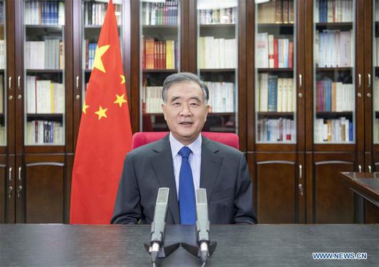 Wang Yang, a member of the Standing Committee of the Political Bureau of the Communist Party of China Central Committee and chairman of the National Committee of the Chinese People's Political Consultative Conference, addresses the 12th Straits Forum held in the port city of Xiamen in southeast China's Fujian Province via video link on Sept. 20, 2020. (Xinhua/Li Tao)