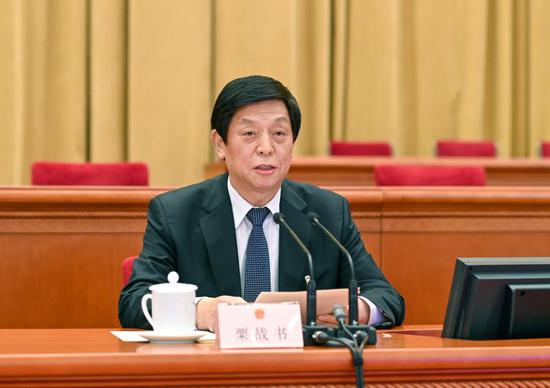 Li Zhanshu, chairman of the National People's Congress (NPC) Standing Committee, presides over a preparatory meeting for the fourth session of the 13th NPC at the Great Hall of the People in Beijing, capital of China, March 4, 2021. (Xinhua/Li Xueren)