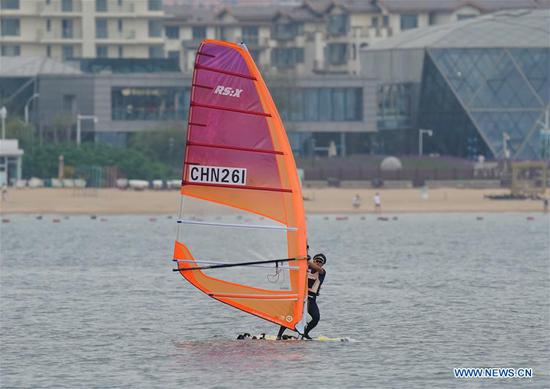 Huang Xianting of Fujian team competes during the women's RS:X class event at 2020 China's National Windsurfing Championships in Qinhuangdao, a coastal city of north China's Hebei Province, Sept. 2, 2020. (Xinhua/Yang Shiyao)