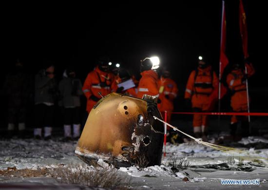 Photo taken on Dec. 17, 2020 shows the return capsule of China's Chang'e-5 probe in Siziwang Banner, north China's Inner Mongolia Autonomous Region. The return capsule of China's Chang'e-5 probe touched down on Earth in the early hours of Thursday, bringing back the country's first samples collected from the moon, as well as the world's freshest lunar samples in over 40 years. (Xinhua/Peng Yuan)