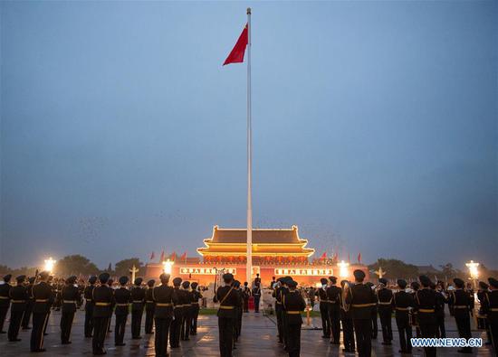 A flag-raising ceremony to celebrate the 71st anniversary of the founding of the People's Republic of China is held at the Tian'anmen Square in Beijing on Oct. 1, 2020. [Photo/Xinhua]