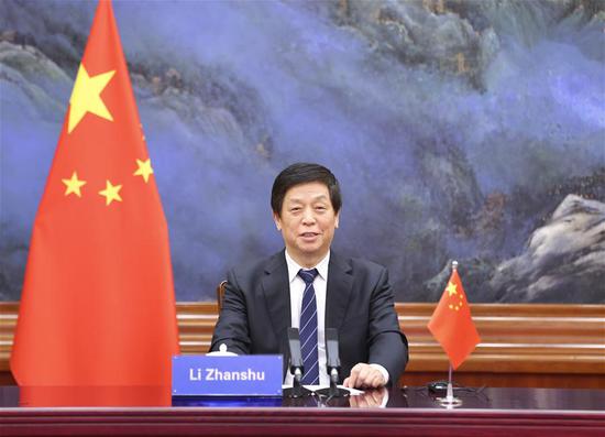 Li Zhanshu, chairman of the National People's Congress Standing Committee, attends a BRICS parliamentary forum via video link at the Great Hall of the People in Beijing, capital of China, Oct. 27, 2020. (Xinhua/Pang Xinglei)