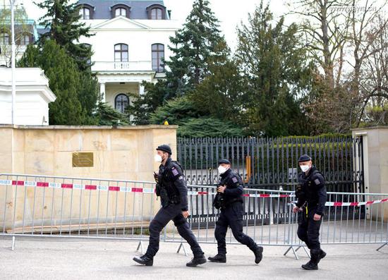 Czech police are seen outside the Russian embassy in Prague, the Czech Republic, on April 22, 2021. The Czech Republic will reduce and put a cap on the number of employees in the Russian embassy in Prague to the same number at the Czech embassy in Moscow, the Czech Foreign Ministry said on Thursday. (Photo by Dana Kesnerova/Xinhua)