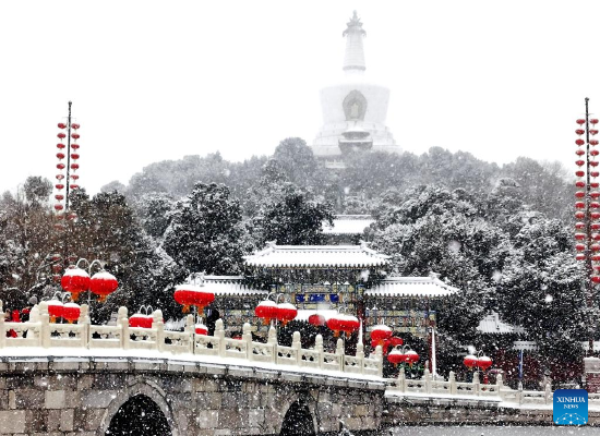 Photo taken with a mobile phone on Feb. 13, 2022 shows a snow view of Beihai Park in Beijing, capital of China. A snowfall hit Beijing on Sunday. (Xinhua/Pan Xu)