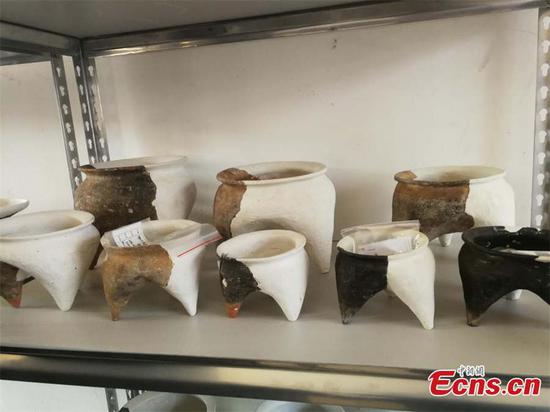 Cultural relics unearthed from historical sites along a trans-provincial water diversion project in Lujiang county, East China's Anhui province. [Photo/China News Service]
