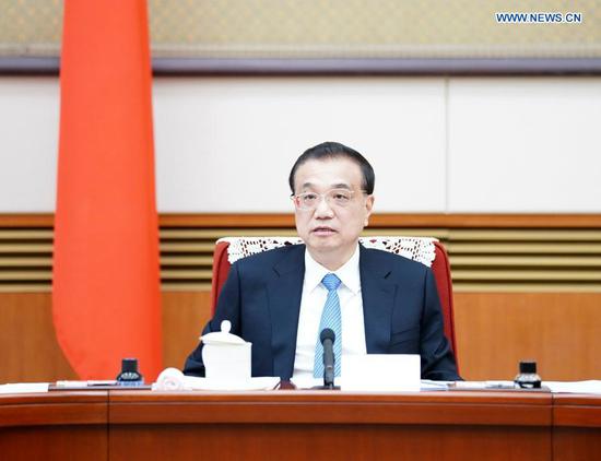 Chinese Premier Li Keqiang presides over a plenary meeting of the State Council in Beijing, capital of China, Jan. 20, 2021. Vice Premier Han Zheng attended the meeting. (Xinhua/Yan Yan)