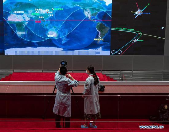 Photo taken on Aug. 2, 2020 shows a scene at the Beijing Aerospace Control Center (BACC) in Beijing, capital of China. China's Mars probe Tianwen-1 successfully carried out its first orbital correction at 7 a.m. (2300 GMT Saturday) after its 3,000N engine worked for 20 seconds, and continued to head for the Mars. (Xinhua/Cai Yang)