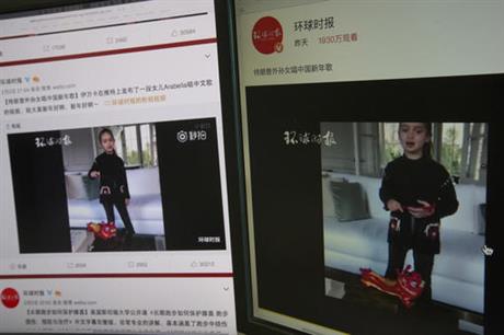 Computer screens display a video clip showing U.S. President Donald Trump's granddaughter Arabella Kushner singing a Chinese New Year greeting song that garnered almost 20 million views in Beijing, China, Friday, Feb. 3, 2017. The brief video clip of Donald Trump's granddaughter singing in Chinese is circulating to strong approval on the internet in China, even while some criticized the U.S. president's failure to send greetings for the Lunar New Year.