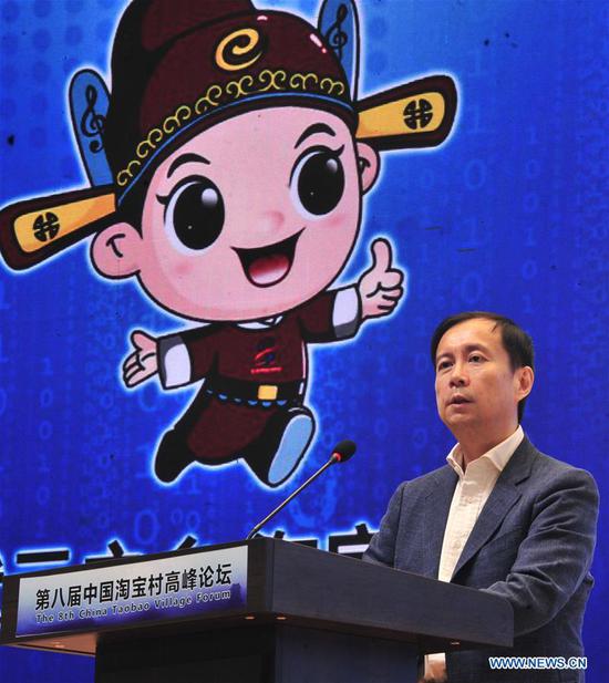 Zhang Yong, executive chairman and CEO of Alibaba, speaks during the 8th China Taobao Village Summit Conference in Suning County, north China's Hebei Province, Sept. 26, 2020. The 8th China Taobao Village Summit Conference was held in Suning on Saturday. The Taobao Villages are rural e-commerce hubs that feature Alibaba's logistics, service and training to encourage farmers to engage in online sales of farm produce and local specialties. With 17 Taobao Villages and 9 Taobao Towns, Suning has a total of over 21,000 e-commerce online stores, achieving a yearly revenue of nearly 10 billion yuan (about 1.47 billion U.S. dollars). (Xinhua/Zhu Xudong)