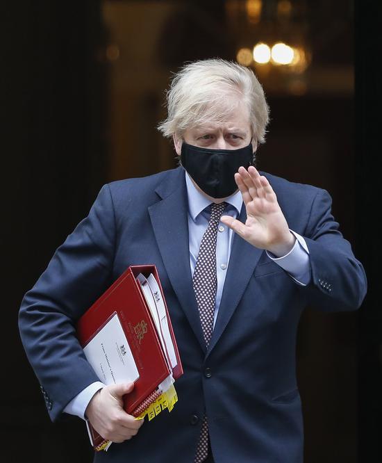 British Prime Minister Boris Johnson leaves 10 Downing Street to the House of Commons in London, Britain, on March 3, 2021. (Xinhua/Han Yan)