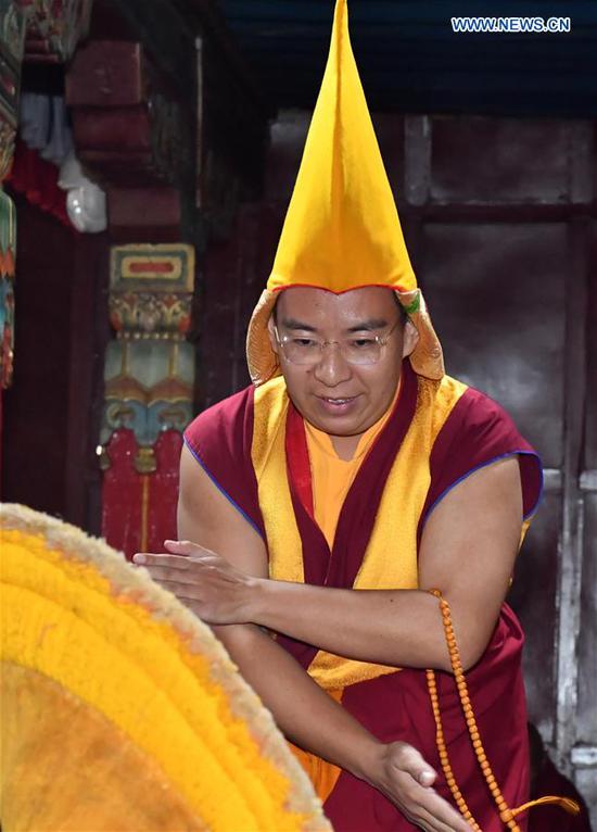 The 11th Panchen Lama, Bainqen Erdini Qoigyijabu, also a member of the Standing Committee of the National Committee of the Chinese People's Political Consultative Conference, vice president of the Buddhist Association of China and president of the association's Tibet branch, participates in a high-level debate on sutras at the Tashilhunpo Monastery in Xigaze, southwest China's Tibet Autonomous Region, Oct. 6, 2020. The 11th Panchen Lama on Oct. 20 completed a tour of southwest China's Tibet Autonomous Region lasting almost three months, during which he performed Buddhist rituals and social activities. (Xinhua/Chogo)