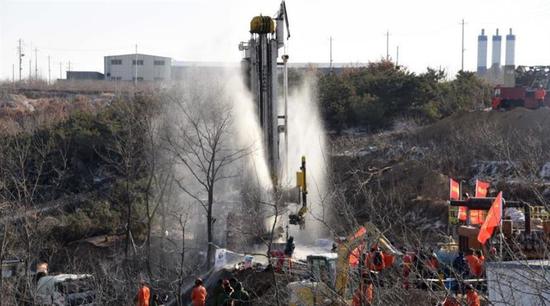 Rescuers work at the explosion site of a gold mine in Qixia City, east China's Shandong Province on January 17, 2021.