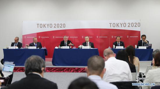 International Olympic Committee (IOC) president Thomas Bach (3rd L) and Tokyo 2020 president Mori Yoshiro (3rd R) attend a joint press conference in Tokyo, Japan, Nov. 16, 2020. (Xinhua/Du Xiaoyi)