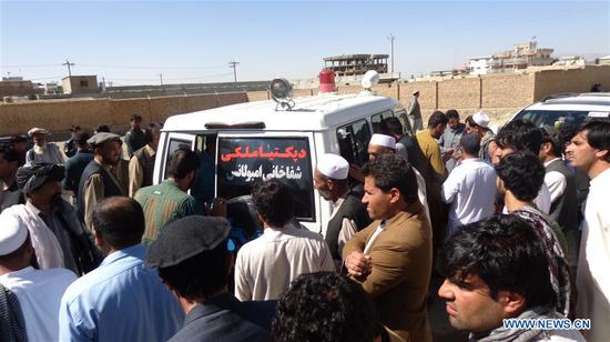 People gather around an ambulance carring the coffin of Deputy to Paktia Provincial Council Ayoub Gharwal in Gardez city, capital of eastern Paktia province, Afghanistan, on Sept. 19, 2020. Gunmen shot and killed the deputy provincial council in Gardez city on Saturday morning, the latest in a string of targeted attacks in the country, provincial governor confirmed. (Photo by Ahmadi/Xinhua)