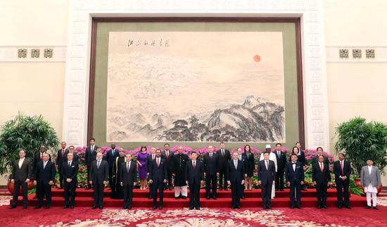 Chinese President Xi Jinping poses for a group photo with ambassadors at the Great Hall of the People in Beijing, capital of China, April 14, 2021. Xi Jinping on Wednesday received the credentials of new ambassadors to China from 29 countries at the Great Hall of the People in Beijing. (Xinhua/Yao Dawei)