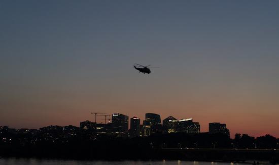 A helicopter flies over the Potomac River in Washington D.C., the United States, July 2, 2020. (Xinhua/Liu Jie)