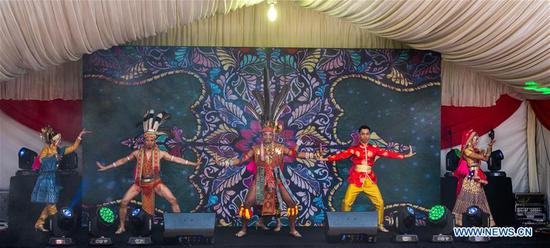 Malaysian dancers perform traditional dancing during the opening ceremony of the China-Malaysia Culture and Tourism Month-Fun with Nature campaign in Kuala Lumpur, Malaysia, Sept. 26, 2020. The China-Malaysia Culture and Tourism Month-Fun with Nature campaign kicked off on Saturday at Malaysia's National Zoo, drawing over 1,000 visitors on its first day. (Xinhua/Zhu Wei)