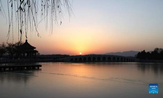 Photo taken on Nov. 25, 2021 shows the sunset scenery of the Summer Palace in Beijing, capital of China. (Xinhua/Chen Jianli) 