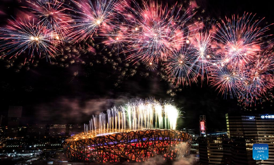 Fireworks illuminate the night sky during the closing ceremony of the 24th Olympic Winter Games at the National Stadium in Beijing, capital of China, Feb. 20, 2022. (Xinhua/Wu Huiwo)