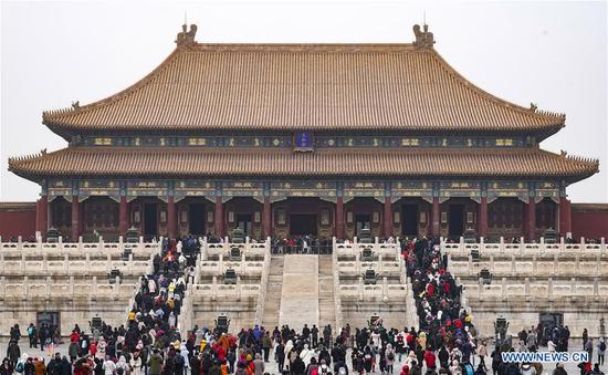 Tourists visit the Palace Museum in Beijing, capital of China, Feb. 5, 2019, the first day of Chinese Lunar New Year. (Xinhua/Shen Bohan)