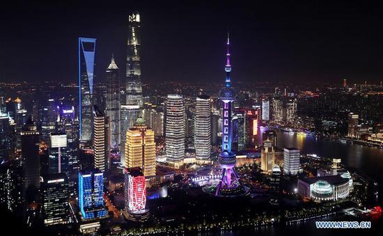 Photo taken on Oct. 26, 2020 from the Sinar Mas Plaza shows a view of the Lujiazui area in Shanghai, east China. A light show will be held on Nov. 5 to celebrate the opening of the third China International Import Expo (CIIE), which will take place in Shanghai from Nov. 5 to 10. (Xinhua/Fang Zhe)