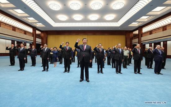 Xi Jinping leads other Communist Party of China (CPC) and state leaders Li Keqiang, Li Zhanshu, Wang Yang, Wang Huning, Zhao Leji, Han Zheng and Wang Qishan to review the Party admission oath after visiting an exhibition on CPC history themed 