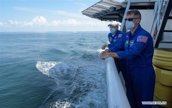  NASA Chief Astronaut Pat Forrester (L) and NASA astronaut and Crew Recovery Chief Shane Kimbrough onboard the SpaceX recovery vessel GO Navigator, prepare for a splashdown of the SpaceX Crew Dragon 