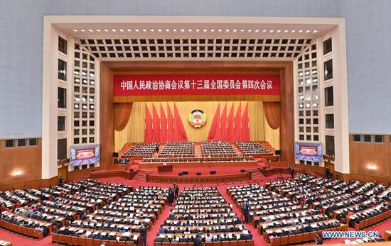 The second plenary meeting of the fourth session of the 13th National Committee of the Chinese People's Political Consultative Conference (CPPCC) is held at the Great Hall of the People in Beijing, capital of China, March 7, 2021. (Xinhua/Li Xin)