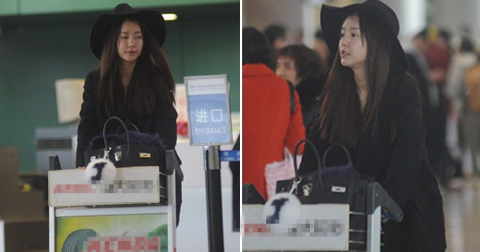 张子萱独自现身机场 全黑装身材依旧苗条