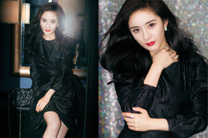 杨幂黑裙秀白嫩长腿妩媚动人