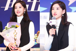 奶茶妹妹穿黑白套装手捧鲜花温婉动人