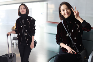 佟丽娅起早赶飞机对镜头比V笑意浓浓