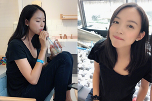 张梓琳陪女儿玩滑梯 素颜出镜皮肤光滑