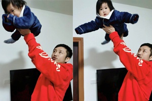 “拳王”邹市明举女儿玩耍温馨