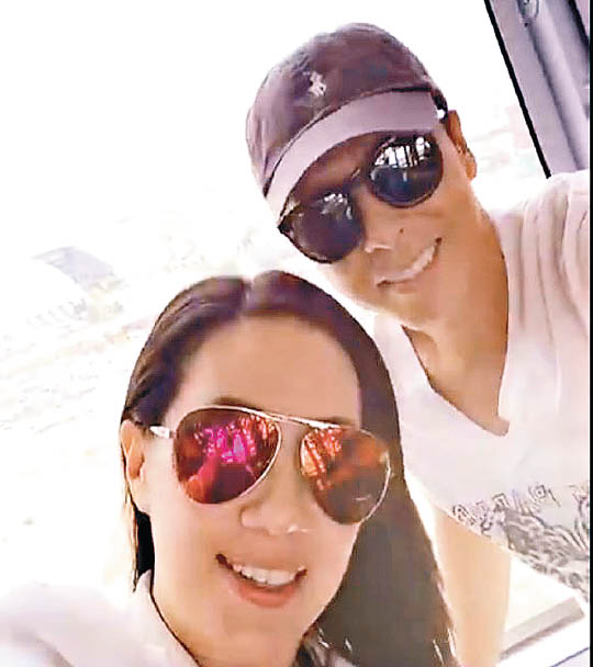 甄子丹与太太昨天（6月5日）一起去玩摩天轮。