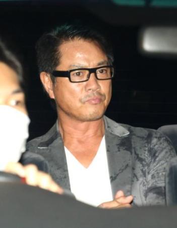 被警方抓捕的高知东生