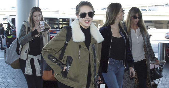 史泰龙家三姐妹机场斗艳 颜值与长腿齐飞