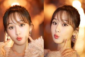 杨紫携邓伦走红毯 俏皮秀表情