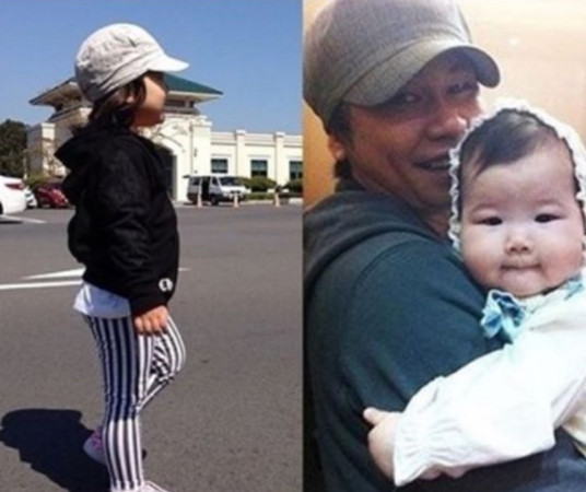 梁铉锡女儿小时候就爱跟爸爸戴一样的帽子