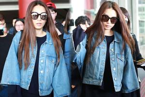 Hebe素颜现身机场长发披肩人气旺