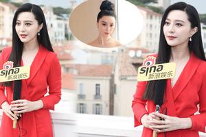 范冰冰红裙娇艳频频撩发 手上钻戒吸睛