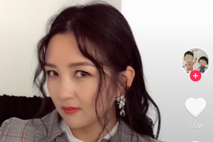 何洁晒近照变胖不少幽默自侃 裙子拉链断开只能用夹子固定