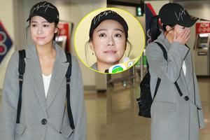 劈腿许志安避走国外后黄心颖返港 见记者落泪