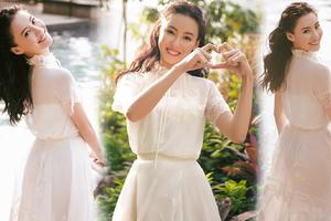 张柏芝穿清新白纱裙对镜甜笑仙气十足