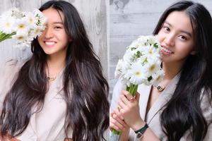 木村光希卷发优雅侧颜精致 手持花束嫣然一笑