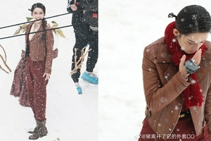 李沁新剧路透雪中独立墨发红唇笑靥如花