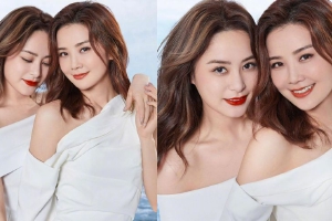 Twins穿白色姐妹装亲密同框 揽肩依偎面露灿笑